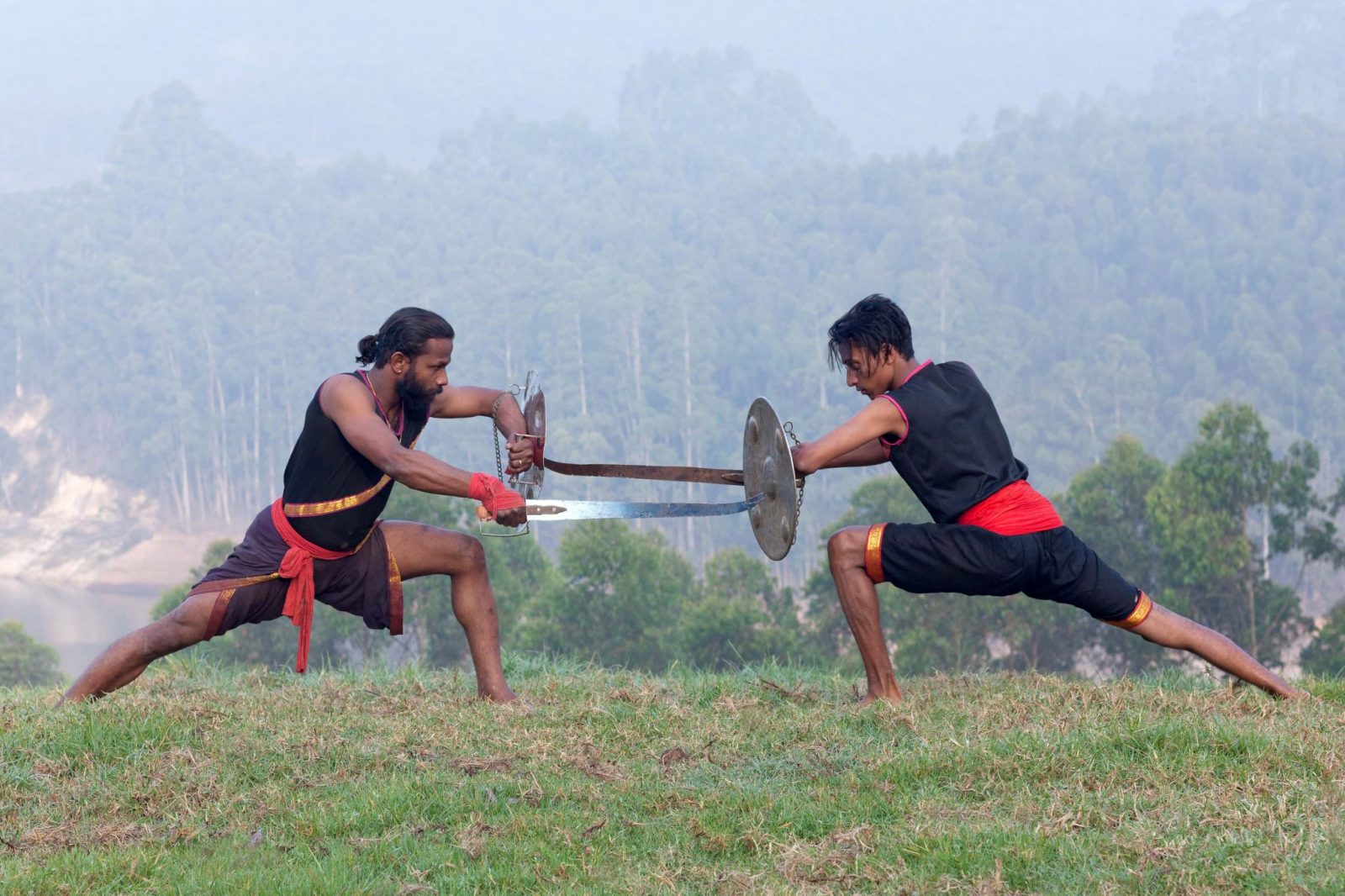 two men practicing martial arts.